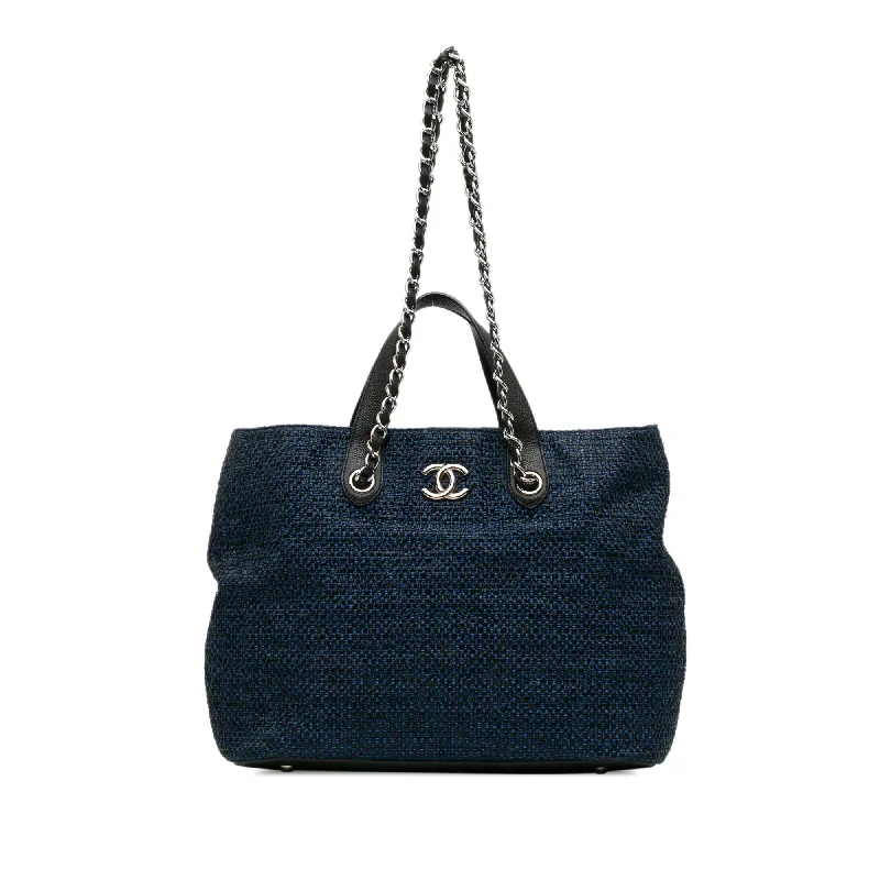 Best bags for business tripsBlue Chanel CC Straw and Caviar Drawstring Shopping Tote Satchel