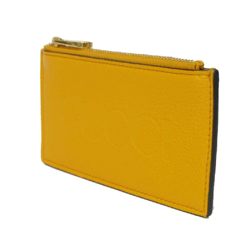 Vintage-inspired handbagsGUCCI Coin case 725550 AABEY 7636 Textured leather yellow Logo embossing Fragment case mens Used