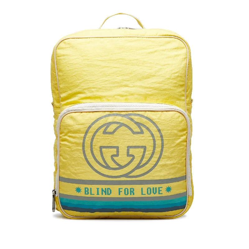 Designer bags with gold hardwareYellow Gucci Blind For Love Backpack