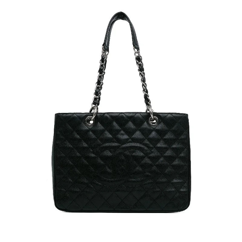 Best bags for business tripsBlack Chanel Caviar Grand Shopping Tote