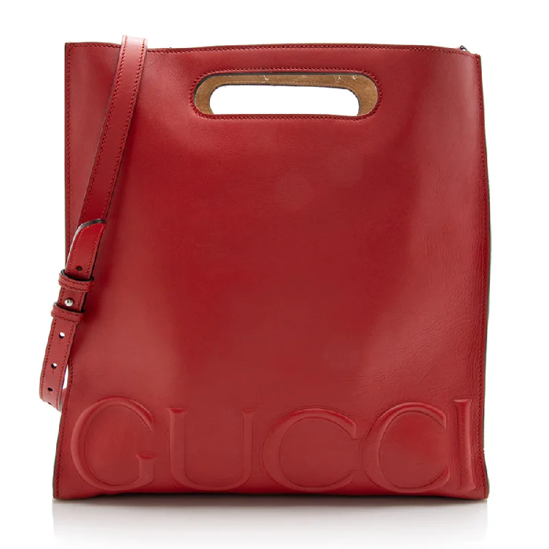 Compact crossbody bags for travelGucci Embossed Leather XL Tote