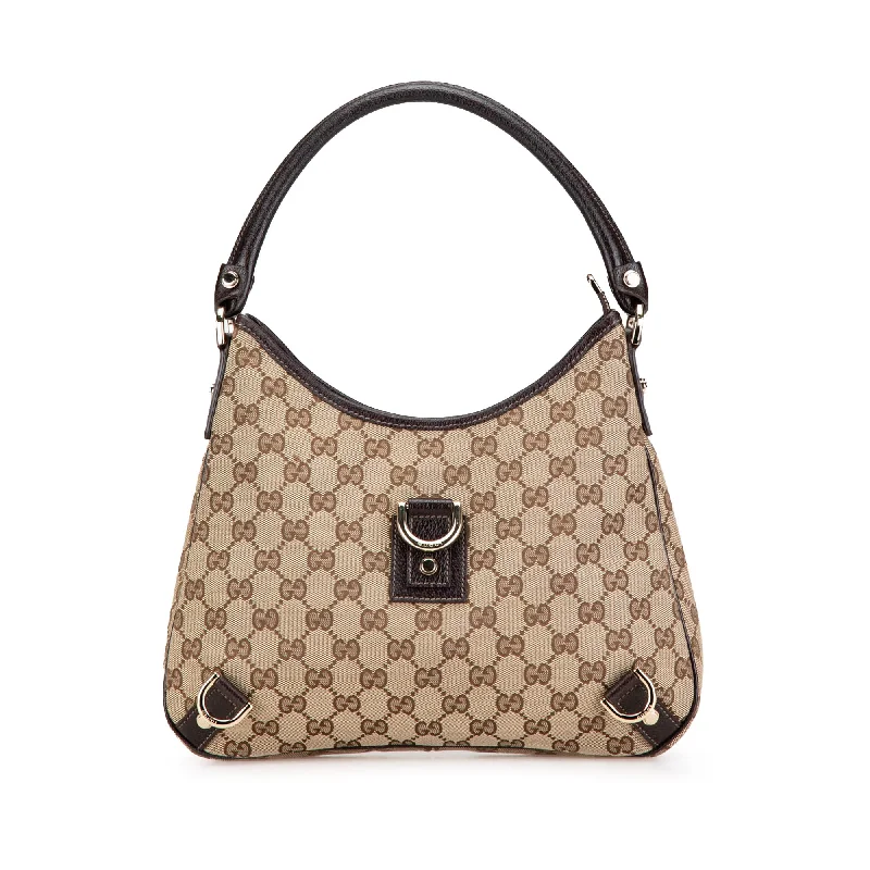 Best bags for business tripsBrown Gucci GG Canvas Abbey D Ring Shoulder Bag