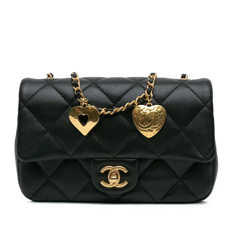 Minimalist leather handbagsBlack Chanel Mini Quilted Lambskin Heart Charms Flap Crossbody Bag